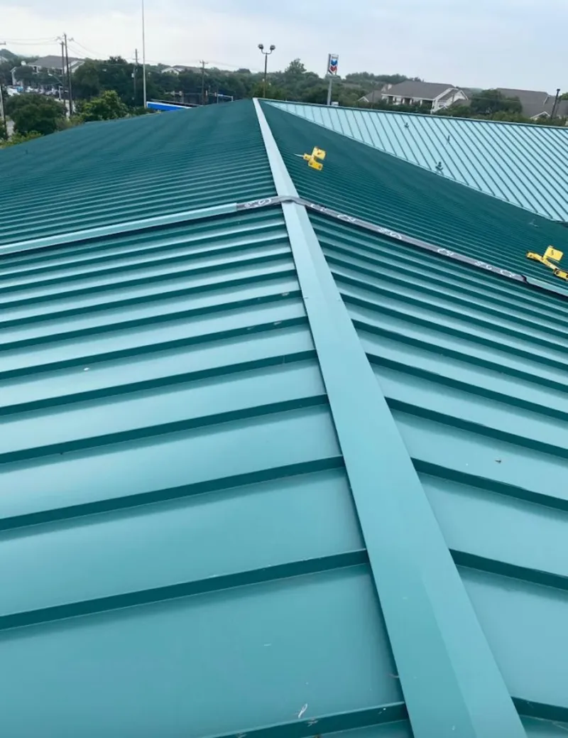 Green commercial metal roof ridge and valley for Metal Roof Repair in Fairmont