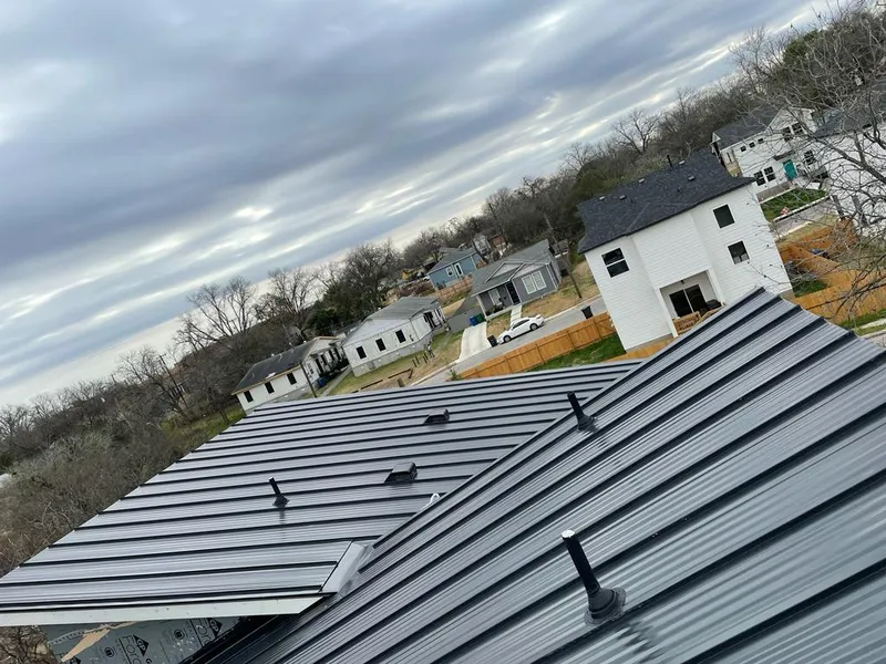 Standing seam metal roof panels with vents for Skylight Repair in Fairmont